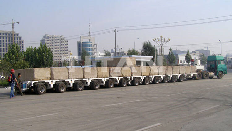 Hydraulic multi axle trailer consist of different modules with 12 axle lines. The full name of SPMT is self propelled modular transporter for sale.